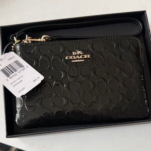 New in box! Coach Black Patent Signature Zip Wristlet with Gold Hardware